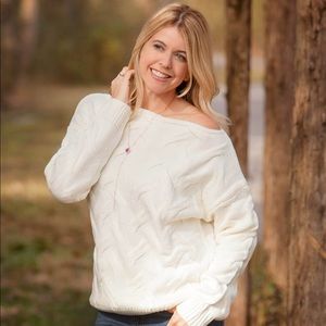 White oversized off the shoulder sweater